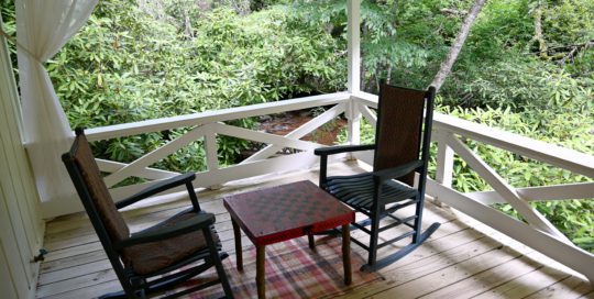 Norton Creek Lodge patio with rocking chairs