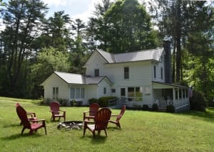 Whittle Pines backyard, firepit and Adirondack chairs
