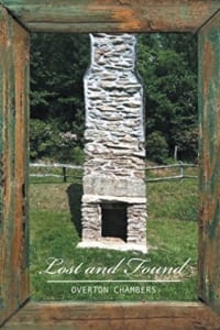 Framed photo of stone fireplace in a field. Text: lost and found, Overton Chambers