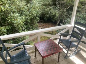 corner-of-porch-overlooking-the-stream-September-2024